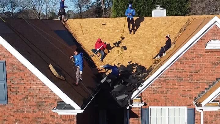 QE Roofing team at work